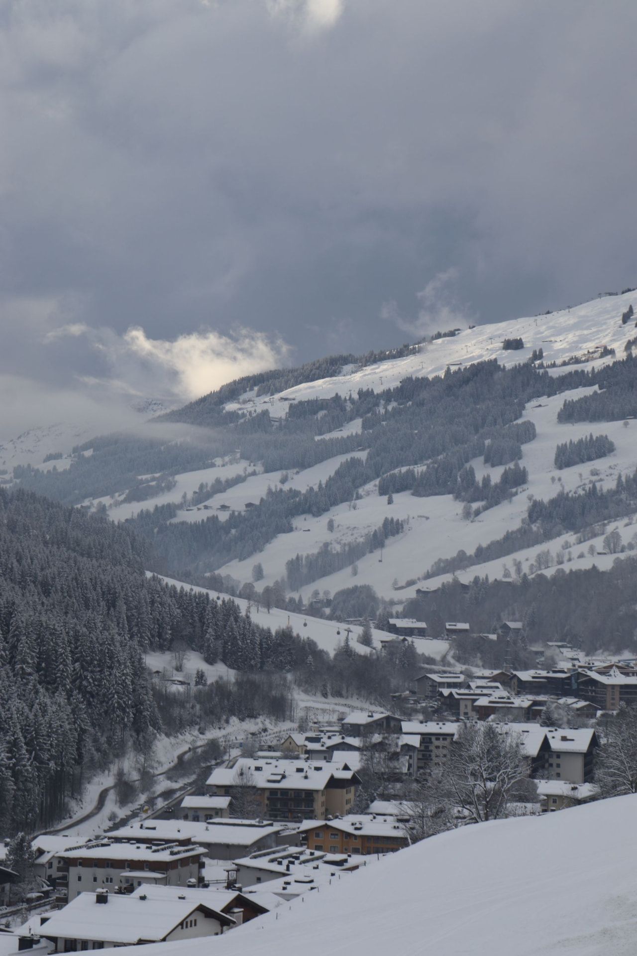 Snowy slopes and village in Saalbach-Hinterglemm, Austria